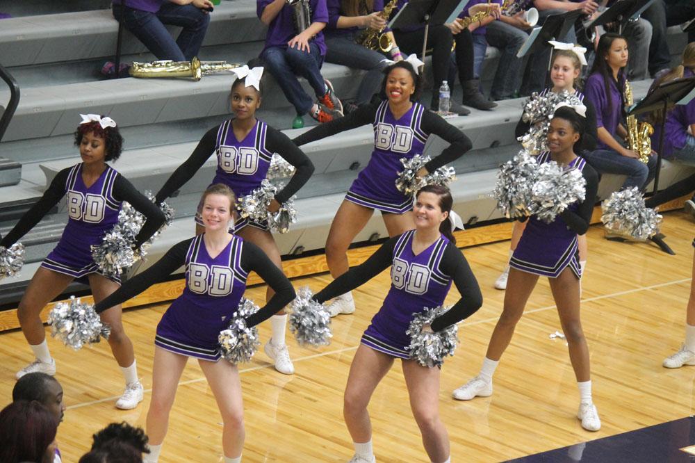 The cheerleaders get the crowd fired up during the season opener at Brownsburg.