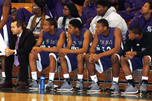 The bench looks on during a 82-44 win at Northwest on Nov. 30.