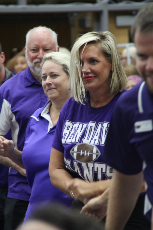 Principal Sandra Squire takes part in the opening day festivities in the main gym. Squire is entering her seventh year as principal at Ben Davis.