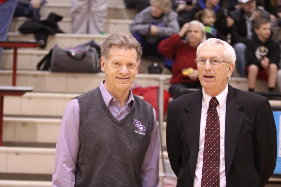 Joe Lentz (left) and Stan Benge (right) have a discussion at a game
