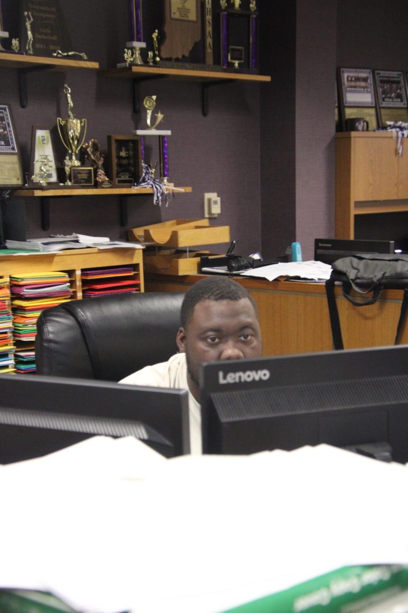 Michael Malone works in the athletic directors office. 