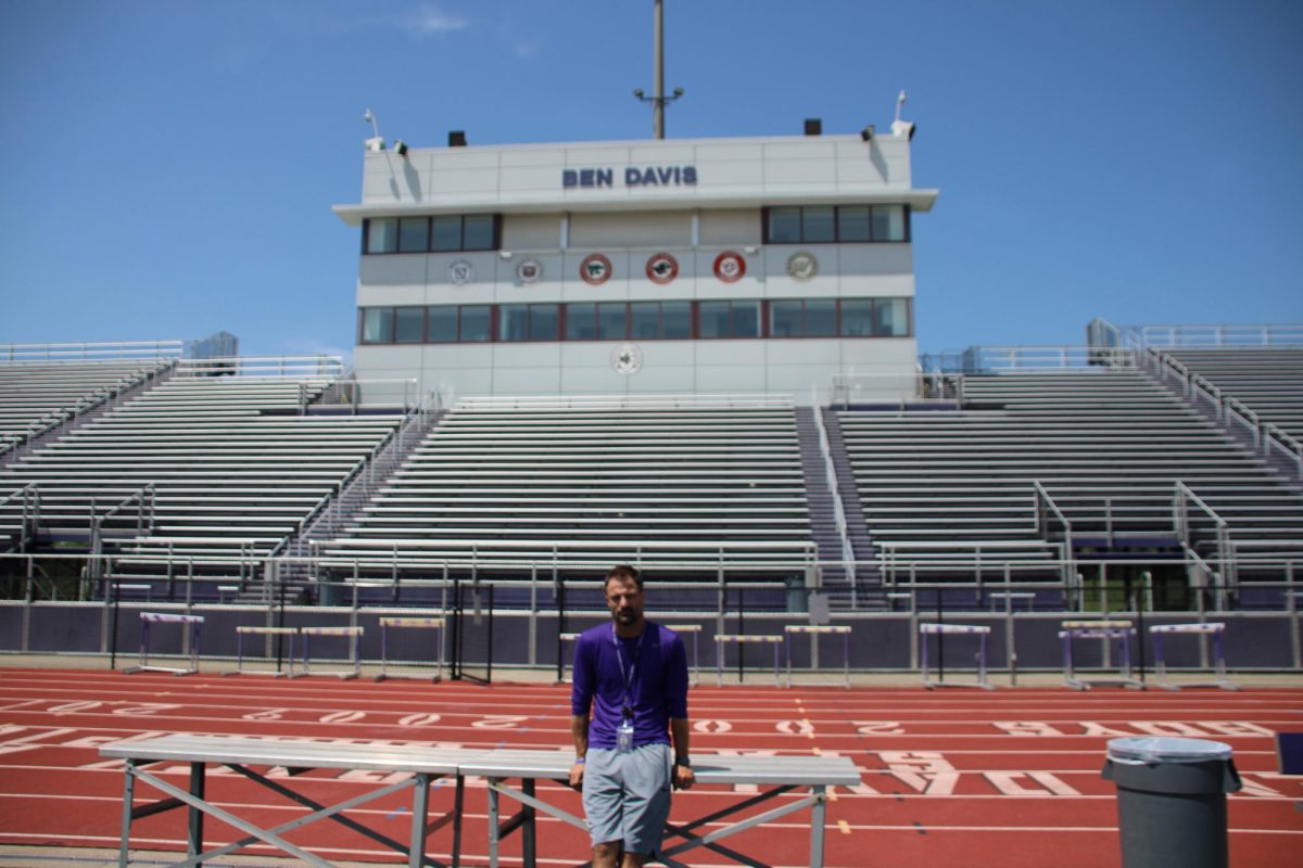 First-year coach Russ Mann poses in front of the home stands at Giants Stadium. Mann has the Giants at 3-0 heading into Fridays highly anticipated home game against IMG Academy. 