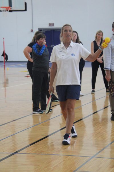 Business teacher Lisa Bugay helped lead a class on pickle ball during Tuesdy’s professional development day.