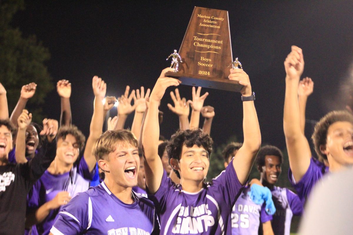 Boys wear county soccer crown