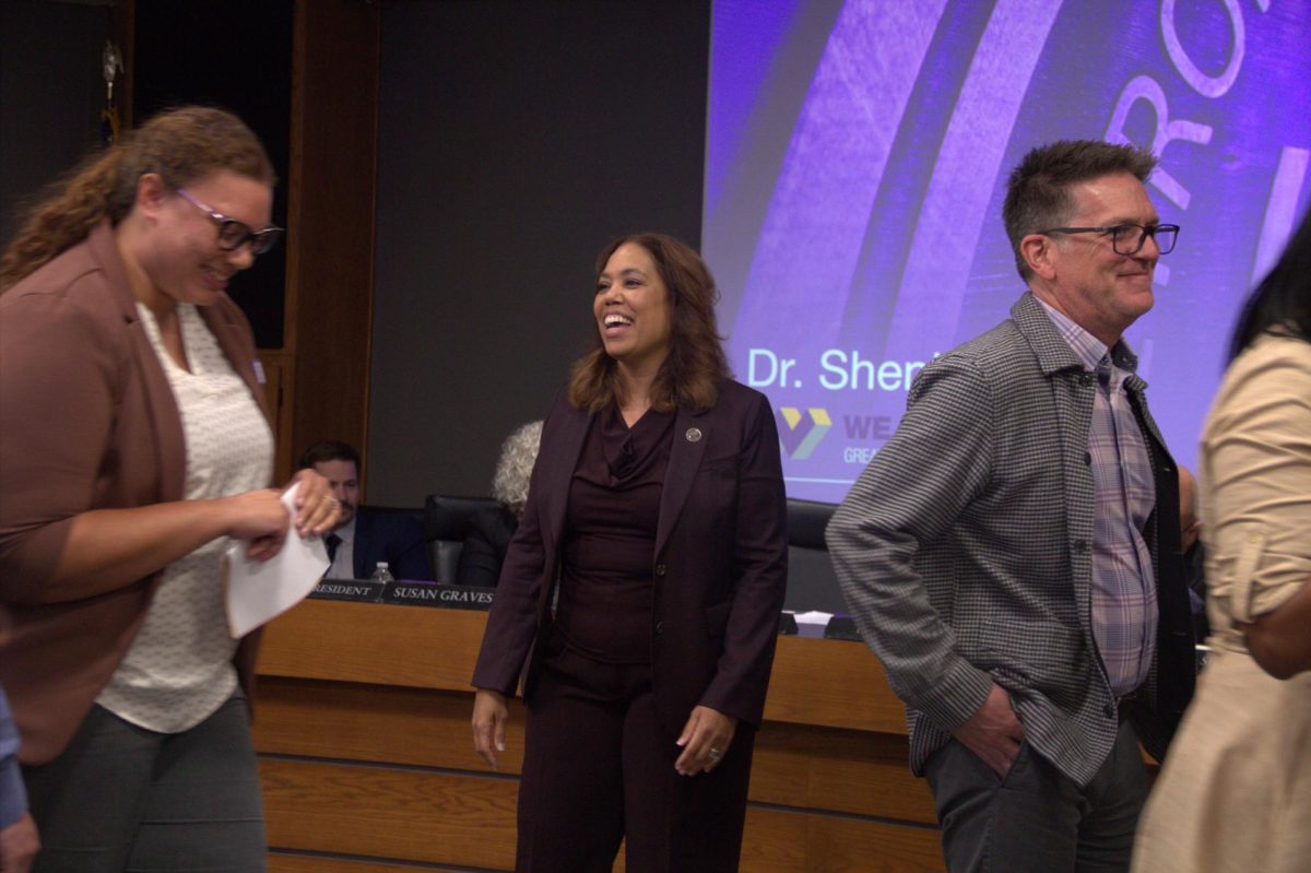 Photo by Lucas Allison 
Wayne Township Superintendent Shenia Suggs is all smiles after being officially named superintendent. 